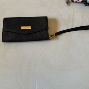 Kate Spade phone case and wallet.